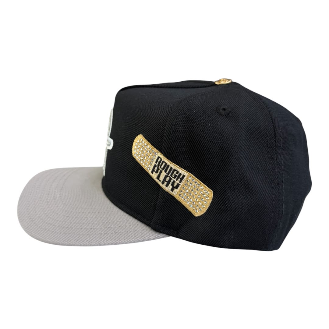 ROUGHPLAY HAT (BLACK/SILVER BANDAID SNAPBACK)